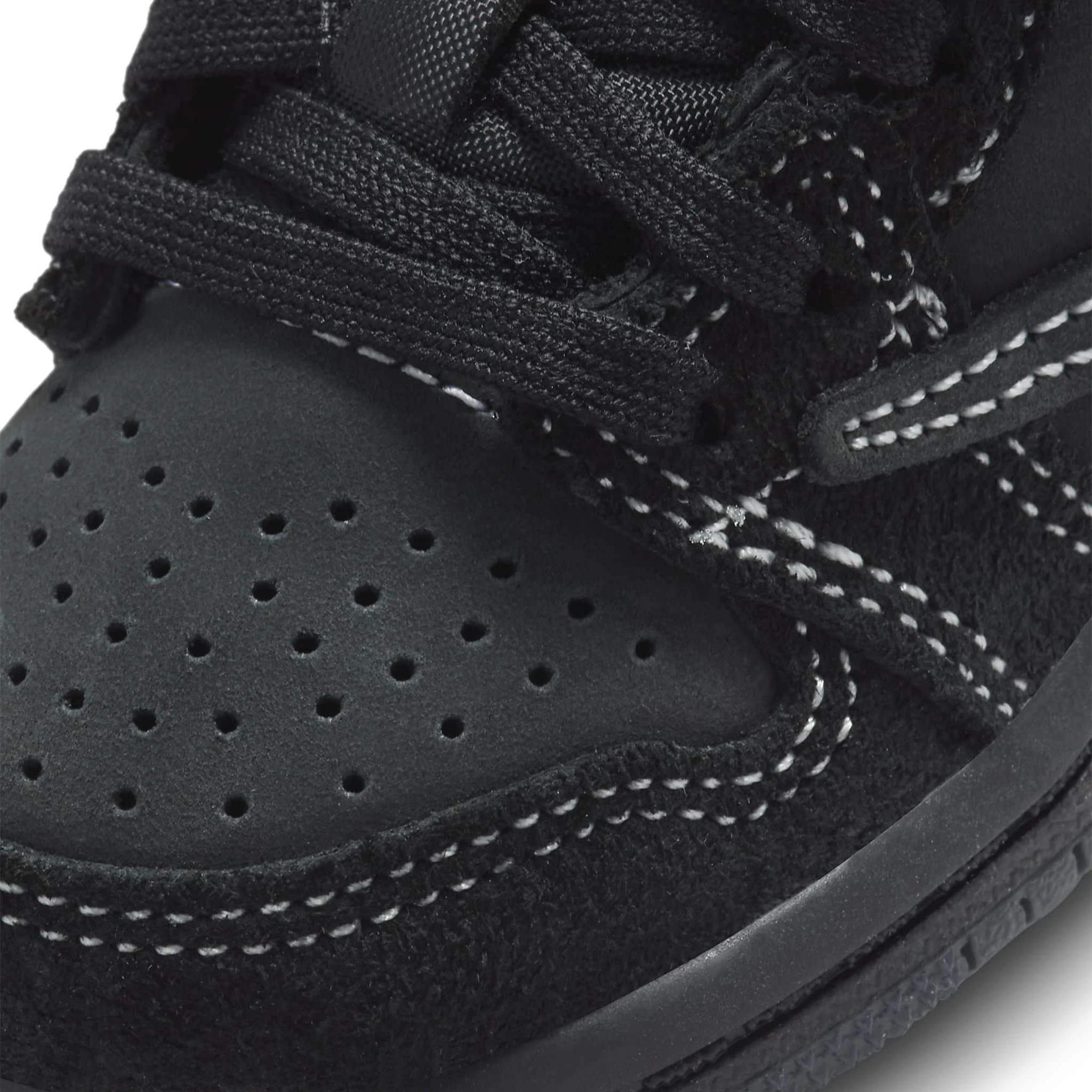 Toe box view of Travis Scott x Air Jordan 1 Low OG SP Black Phantom (TD) DO5441-001